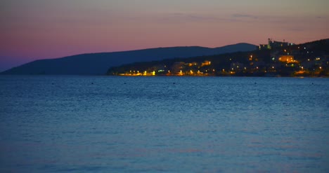 Close-Up-Of-View-Of-Sea-Shore-At-Night-1