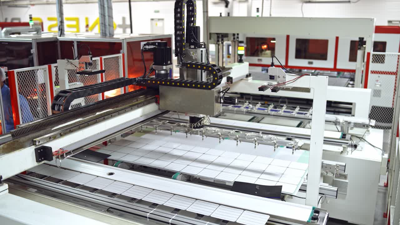 Modern automated solar energy production. Working factory mechanism of making solar cells. Innovation technology concept.