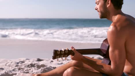 Man-playing-guitar-