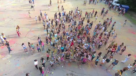 summer outdoor festival. vinnitsa, ukraine - july 2017: young people covered with coloured powder during summer outdoor festival