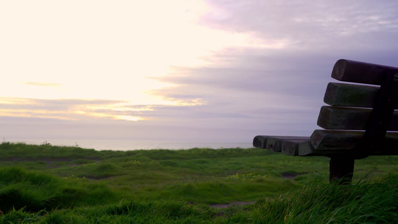 wooden bench at the beach, half moon bay 4