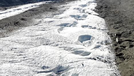 Aerial-view-of-the-Gorner-glacier-and-Matterhorn-on-a-sunny-summer-day-in-Zermatt,-Switzerland