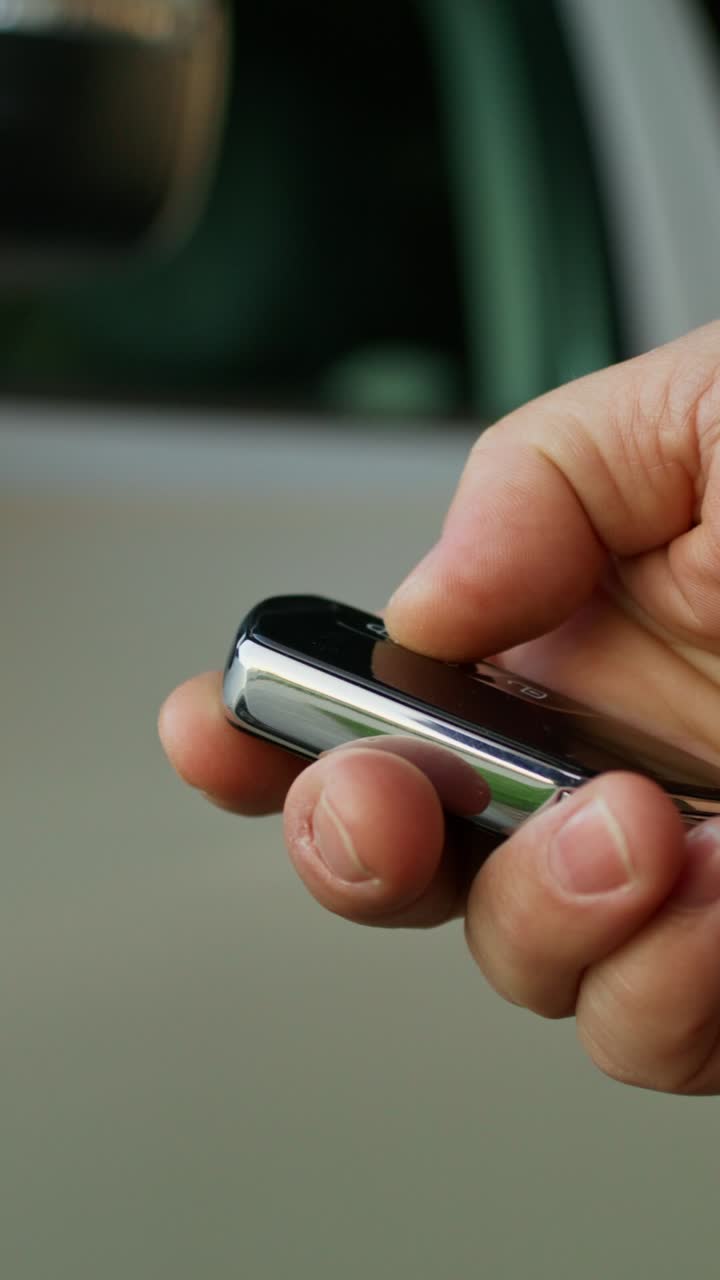 Person Using Car Key Remote