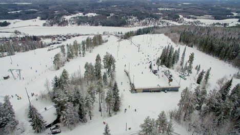 himos ski resort. rising shot. ski lifts and people downhill skiing.
