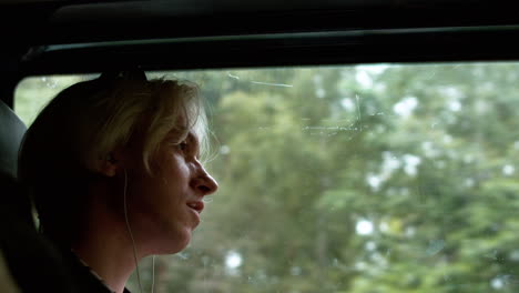 man traveling with earphones