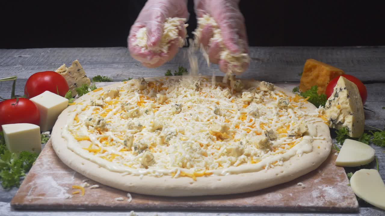 Chef Making a Cheese Pizza with various Cheese Toppings