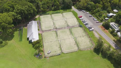 drone captures tennis courts and surrounding park area