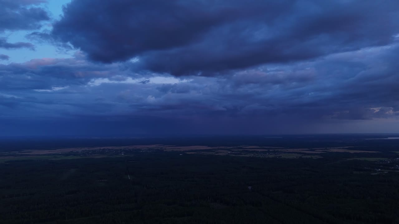 Stormy Sky Over Rural Landscape at Night