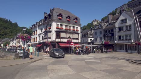 Tourists enjoying the city center of Bouillon along river Semois in the Ardennes - Belgium