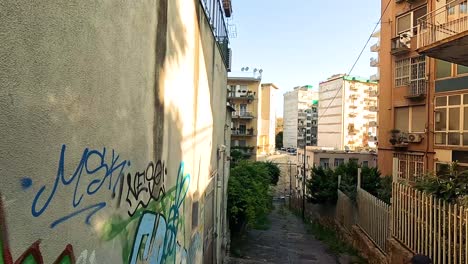 colorful graffiti on alley walls in naples