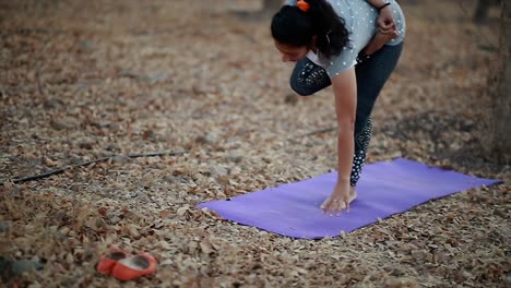 Young-womans-doing-yoga,-On-The-Yoga-And-Meditation-on-the-art-of-relaxation