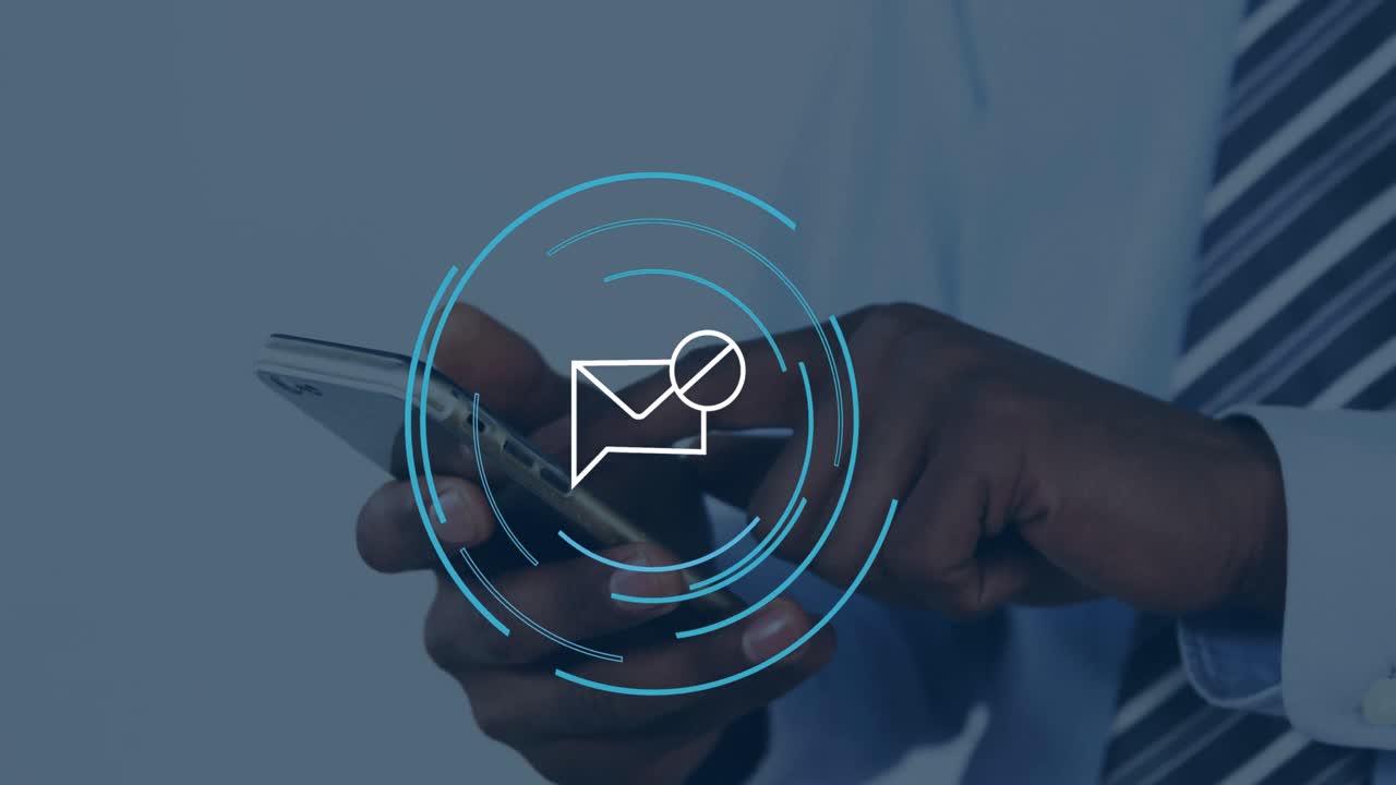 Animation of envelope icon over african american businessman using smartphone in office