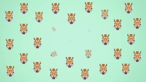 Animation-of-multiple-tiger-heads-on-green-background