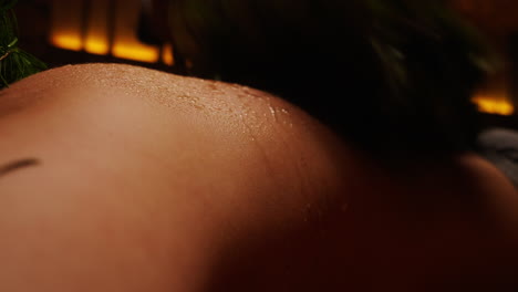 person receiving herbal sauna treatment