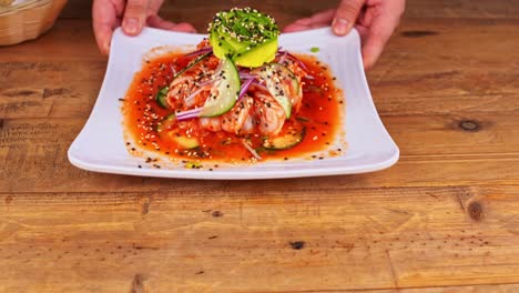 closeup-of-plate-of-aguachile-being-removed-from-a