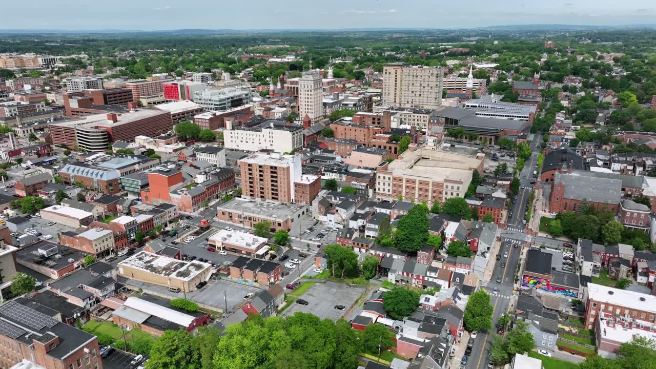 Aerial view of downtown Lancaster, Pennsylvania. Historic buildings, green spaces, and urban layout show the charm and structure of this vibrant American city from above.