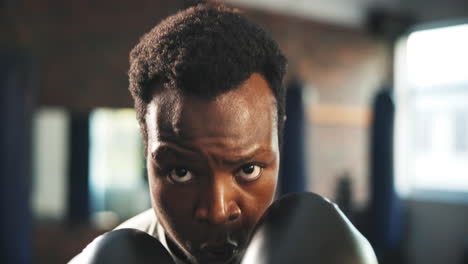 Sports-face,-black-man-or-boxer-punch-training