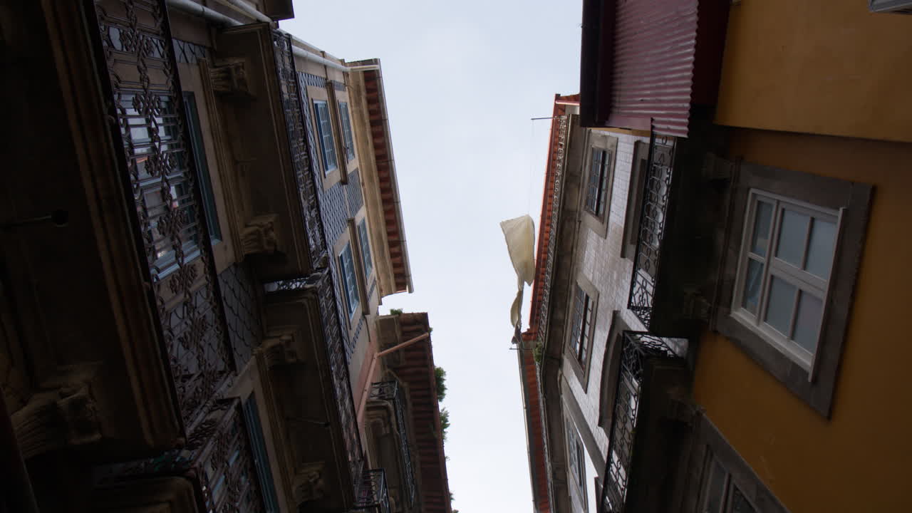 Facade of Historic Buildings in Porto, Portugal - Low Angle Shot