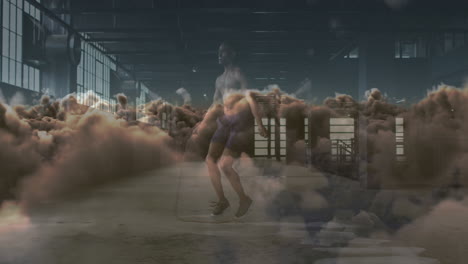 animación de nubes sobre un deportista afroamericano haciendo ejercicio