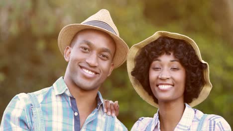 gardener smiling couple holding basket