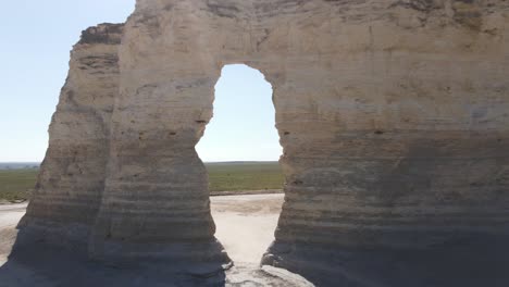 monument rocks in kansas fly through hole in rocks shot