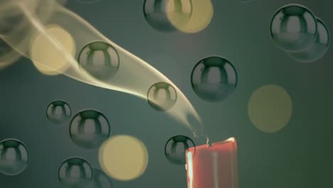 animation of lit candle with flickering spots of light