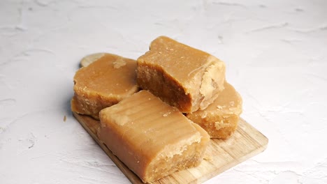 jaggery traditional cane sugar cube on table