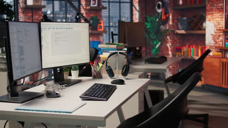 technology unicorn venture workspace with pc used to conduct code reviews