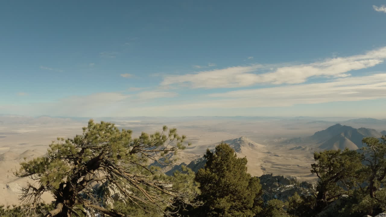 Desert clouds form over the Eastern Sierra Nevada range towards the Mojave Desert in California