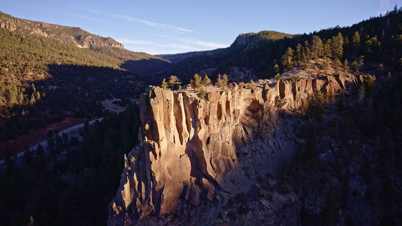 Drone shot gliding over rugged canyon terrain near Los Alamos, New Mexico