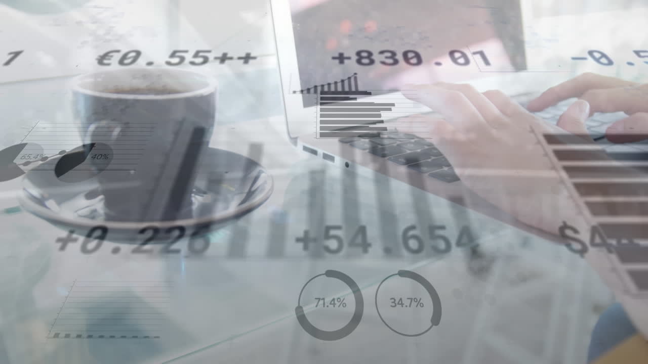 Animation of statistical stock market data processing over mid section of man using laptop at a cafe