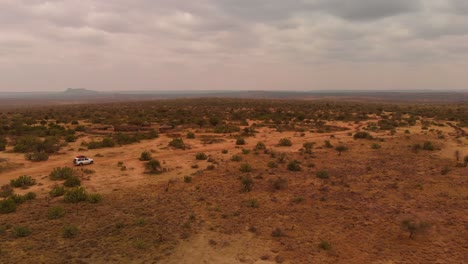 a 4x4 offroad car driving through samburu land in northern kenya