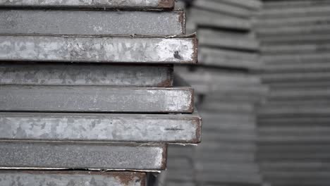 metal recyclables are neatly arranged. appearance is old. truck shot from right to left.