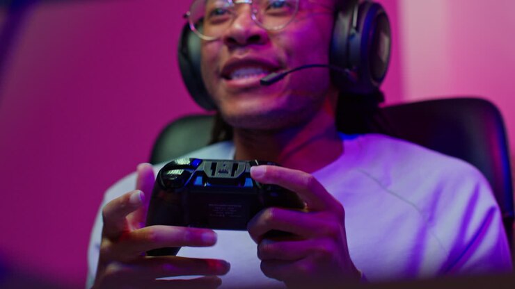 Man playing video games with headset and controller
