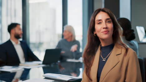 business meeting with woman in beige blazer