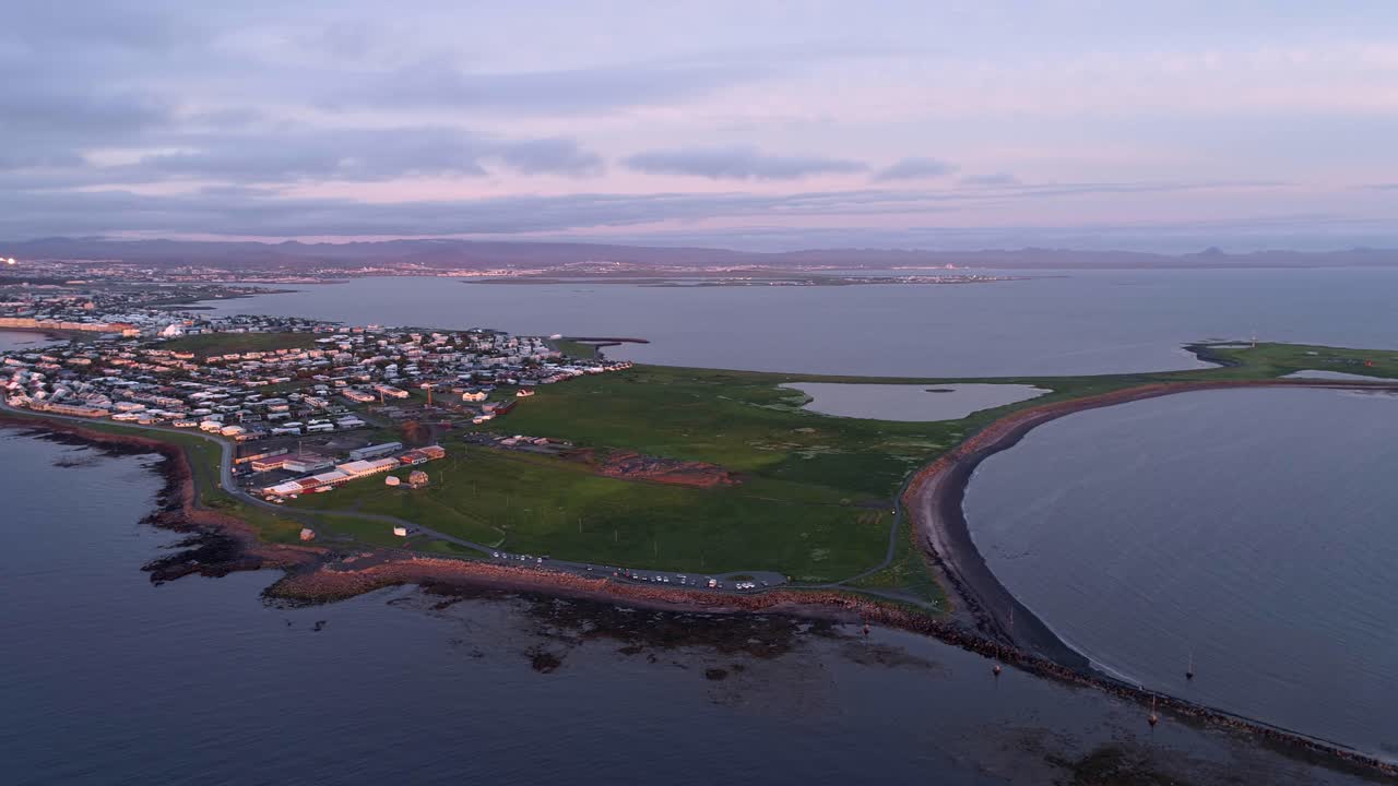 Aerial view of a coastal town in Iceland at sunrise/sunset