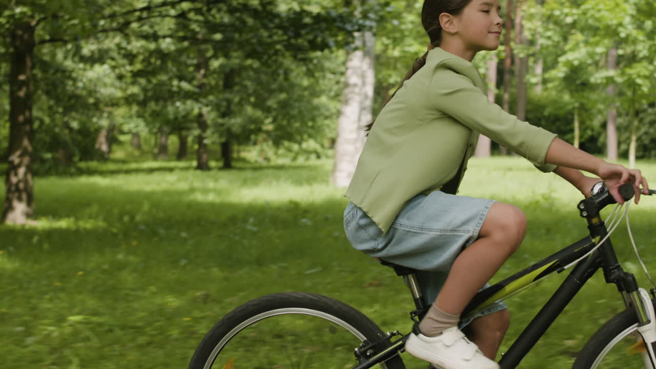 Child riding a bicycle in the park