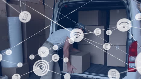 animation of network of digital icons over caucasian delivery man loading boxes in his delivery van