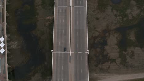 birds eye view of cars going over the the margaret hunt hill bridge in dallas