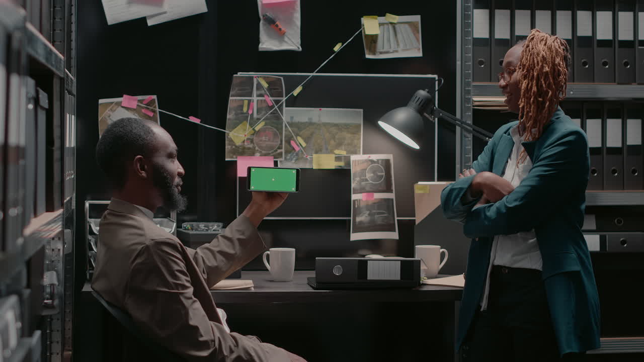 Detectives working on a case in the office