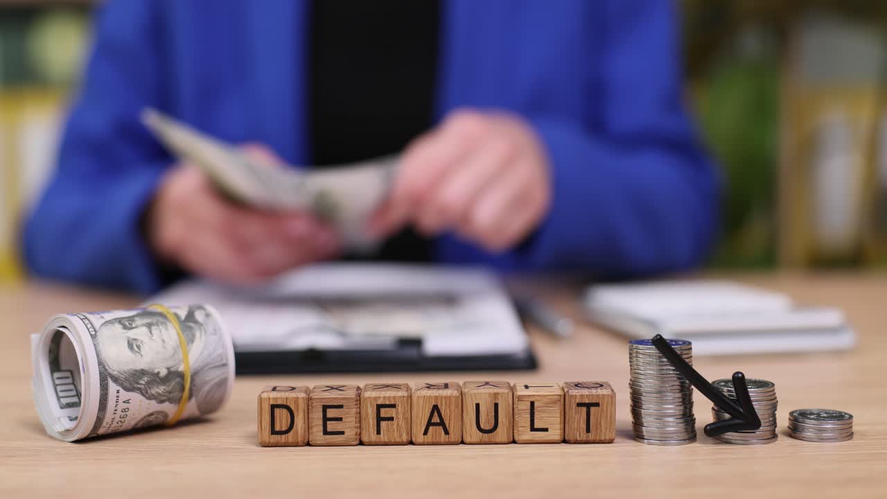 Image representing financial default with money and a descending arrow