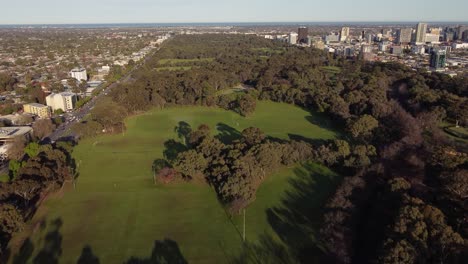 Dronw-shot-flying-over-the-Adelaide-Parklands-and-turning-towards-the-Adelaide-City