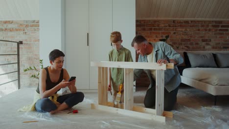 family building furniture together