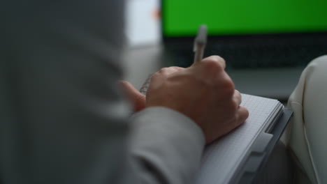 mixed race business couple work together on online meeting green screen laptop.