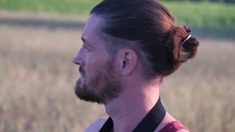 Slow-motion-close-up-shot-of-a-FPV-pilot-thinking-and-biting-his-lip-about-his-flight