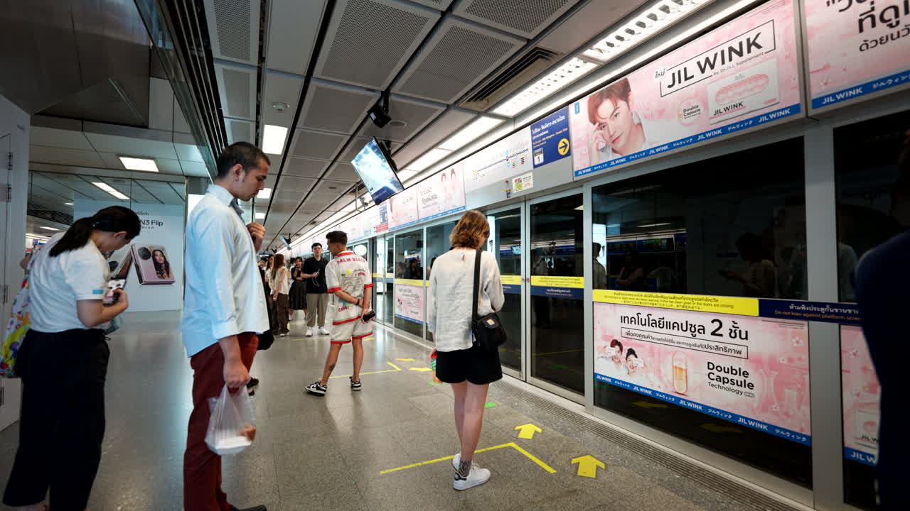 Silent thoughts and weary eyes, passengers dreaming under concrete skies