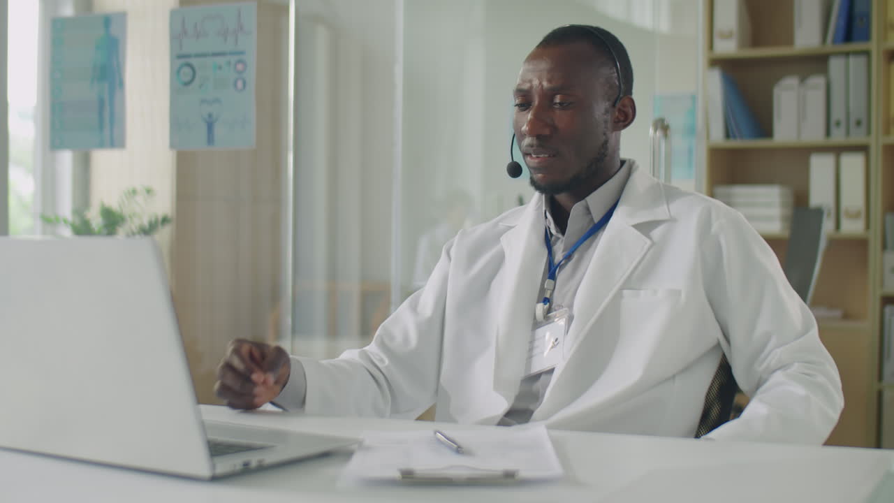 Black Doctor Consulting Patient Online