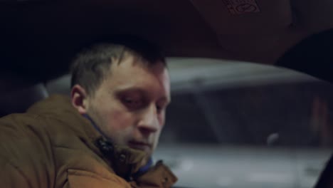 driver fastening the seat belt. closeup view