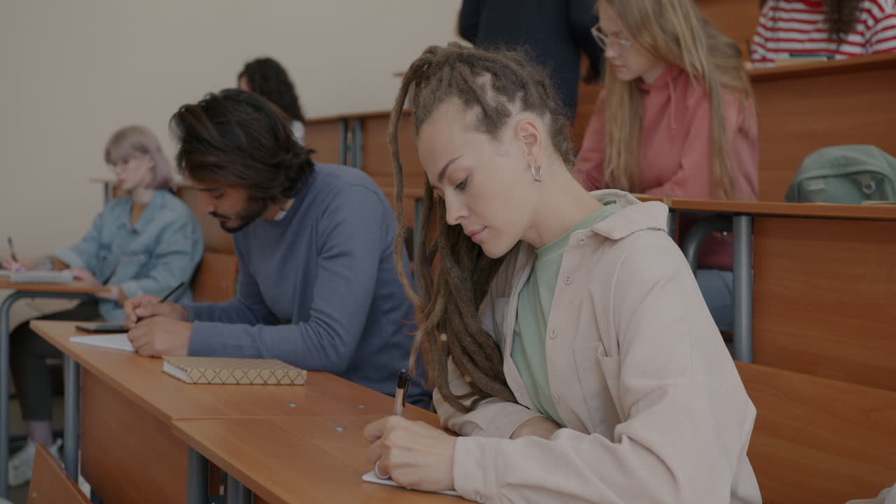 Students Taking Notes in a Classroom