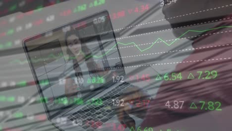 animation of stock market data processing over african american man having a videocall on laptop